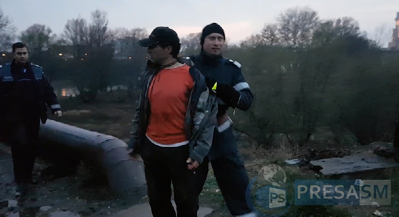 FOTO&VIDEO. Tentativă de suicid pe Podul CFR. La un pas să se arunce în Someș