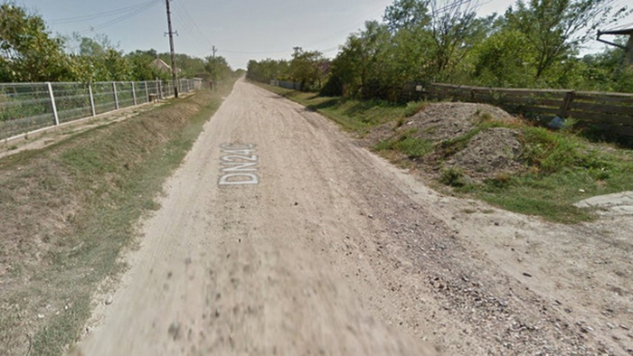 Drumul rușinii din România, abandonat de o firmă din Satu Mare. Drum Național de pământ