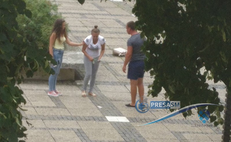 FOTO&VIDEO. Femeie lovită și agresată verbal în centrul Sătmarului. Au intervenit mai mulți trecători!