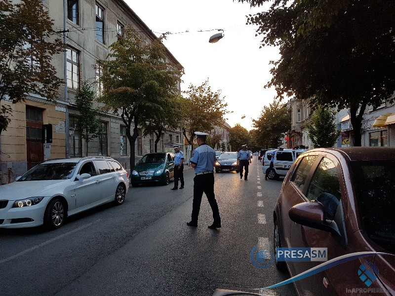 Teroare în centrul Sătmarului. Șoferul unui Porsche a încercat să dea peste niște romi