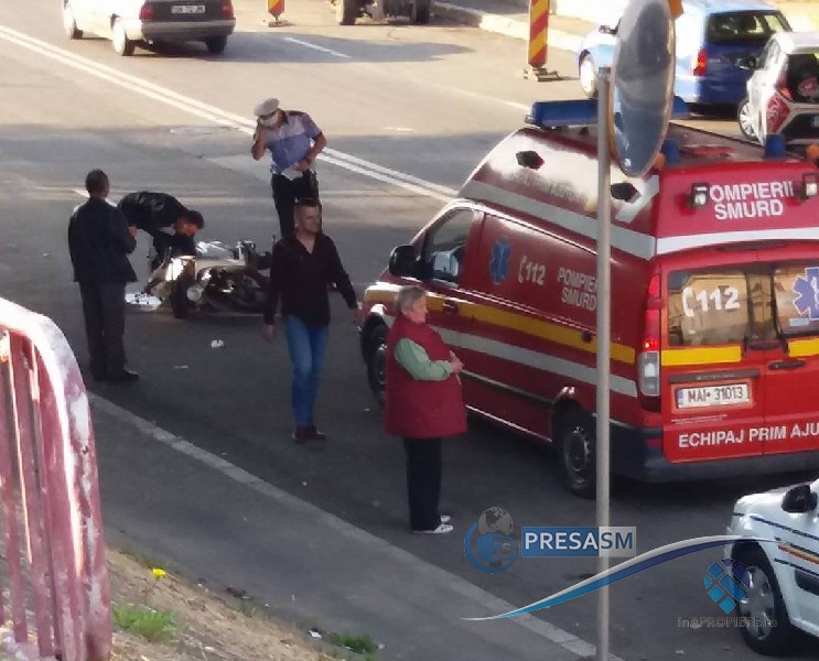 FOTOGALERIE. Accident grav în centrul Sătmarului. Motociclist lovit în plin de un BMW