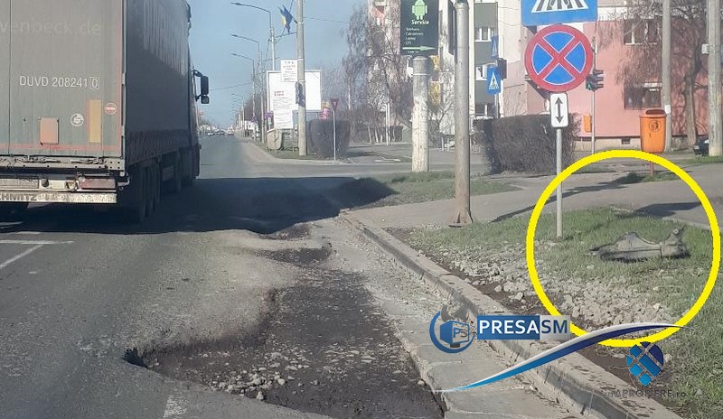 FOTO. Groapa în care sătmărenii își lasă bucăți din mașină! Tehnic Asist, chemat de urgență