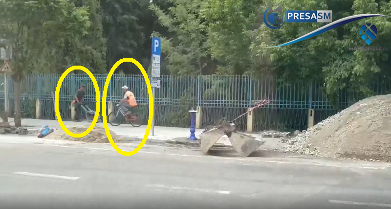 VIDEO. Reabilitare trotuare în Satu Mare: Unul lucrează, unul pe bicicletă, șase stau
