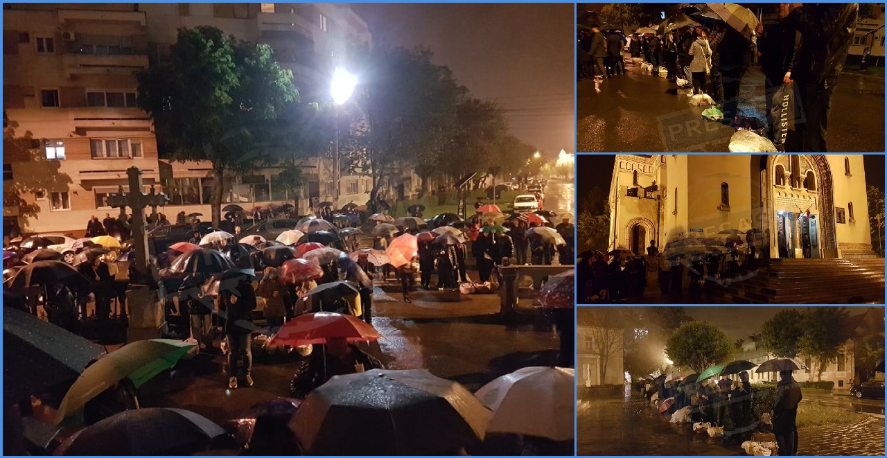 FOTO. Sătmărenii, înarmați cu umbrele, la slujbele de Înviere