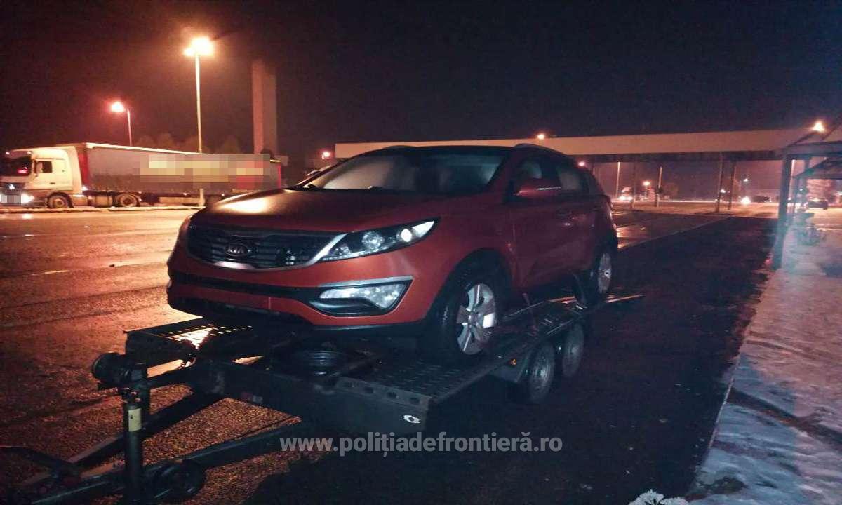 FOTO. Cum aduci în țară o mașină căutată?! Direct prin vamă, pe platformă!