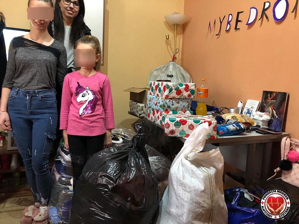 FOTO. Familie cu suflet mare. A luat în casă o tânără care a crescut în condiții deosebit de grele