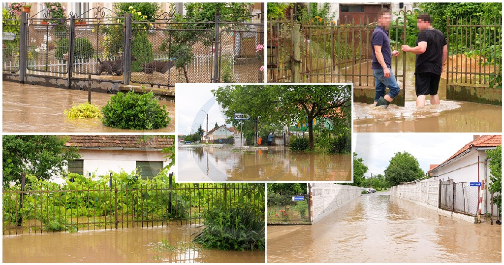 FOTOGALERIE. Ardudul este sub apă. Case și drumuri inundate după o ploaie de zeci de minute