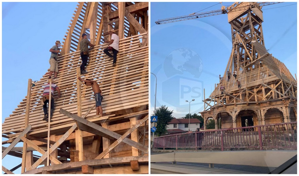 FOTO. Muncitori în pericol! Neasigurați, lucrează la înălțime la biserica de la Podul Golescu, în Satu Mare