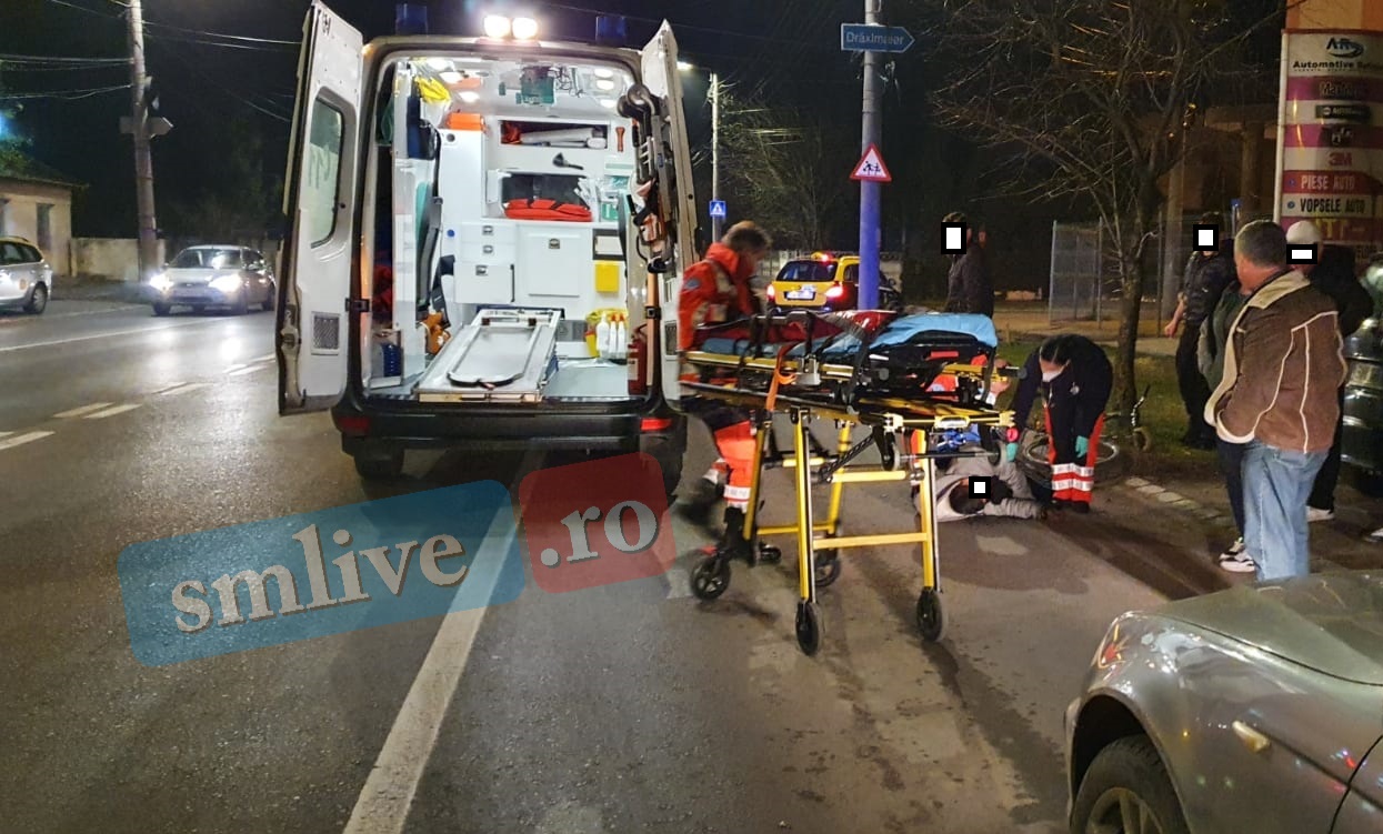 FOTOGALERIE. Un biciclist beat a căzut de pe bicicletă și a adormit pe șosea, în municipiul Satu Mare