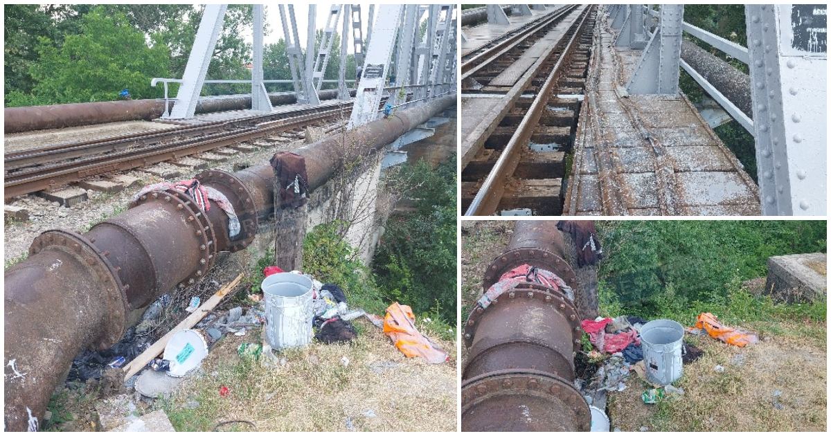 FOTO. Mizerie la Podul de Fier, după revopsire. Gunoaie și găleți de plastic, aruncate la întâmplare, în natură