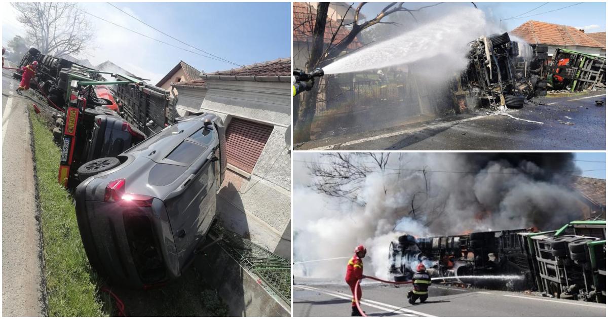 FOTO. Incendiu violent după ce un alt TIR încărcat cu mașini noi s-a răsturnat pe un drum din țară