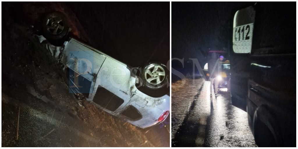 FOTO. Accident teribil lângă Aeroportul Satu Mare. Mașină răsturnată în șanț, victime ajutate de un voluntar SVSU