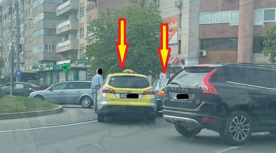 FOTO. Regii șoselelor! Un taximetrist și un șofer de BMW ”discută” în mijlocul sensului, la Crinul