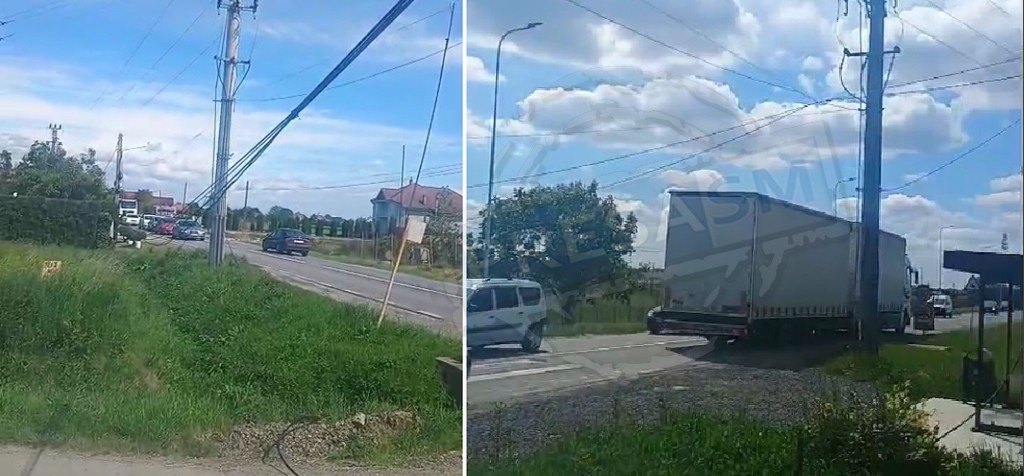 FOTO/VIDEO. Accident neobișnuit în Odoreu: Un camion a smuls cablurile de electricitate și telefonie