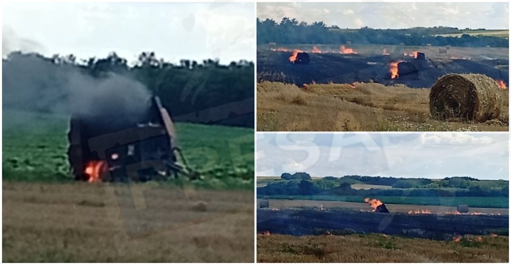 FOTO. Incendiu în zona poligonului militar din Tătărești. O presă de balotat, distrusă complet! Flăcările s-au extins