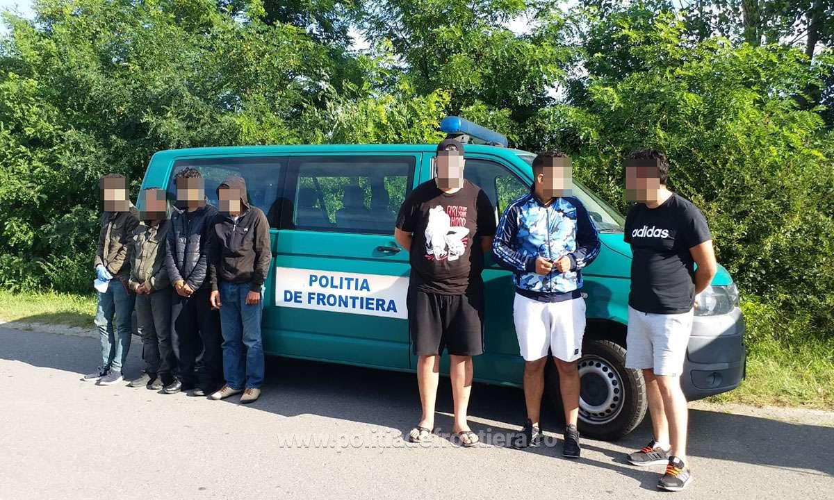 Migranți opriți cu focuri de armă